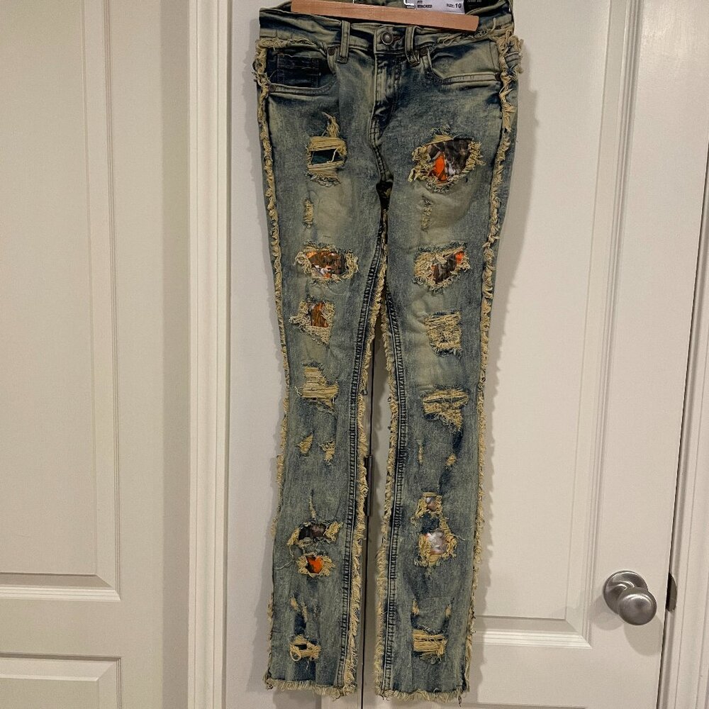 Evolution In Desing,  Ripped Jeans for Women  10. Fit: Stacked
